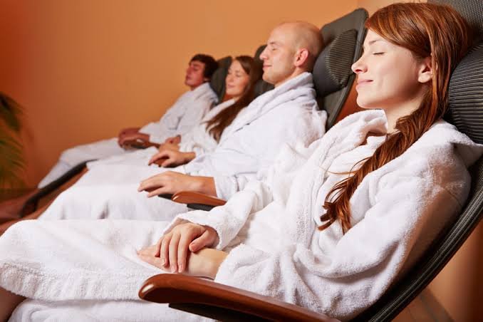 Corporate wellness activation with guests in robes